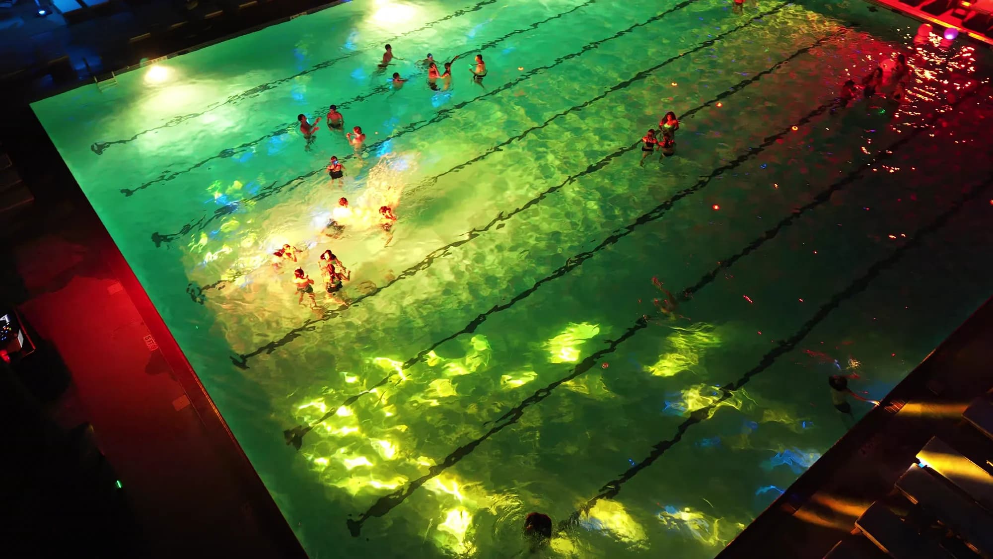 Gallery: the deck at night with lights on.